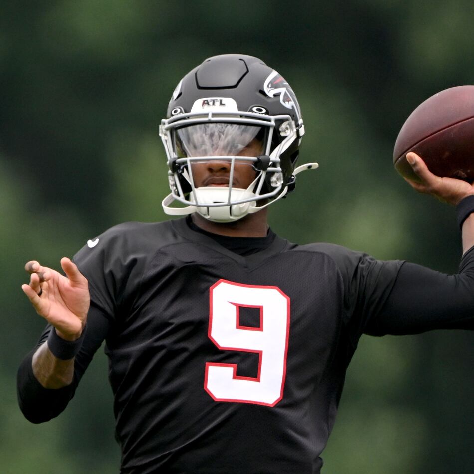 Falcons quarterback Michael Penix Jr. runs a drill during an OTA workout at the team's traning facility on Wednesday, May 27, 2026, in Flowery Branch. (Hyosub Shin/AJC)
