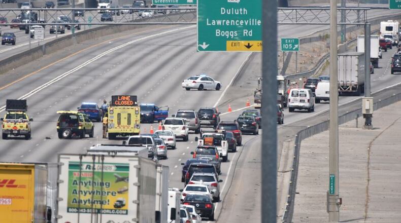 Traffic backups were severe Thursday on I-85 northbound in Gwinnett County after a crash that killed two people. HYOSUB SHIN / HSHIN@AJC.COM