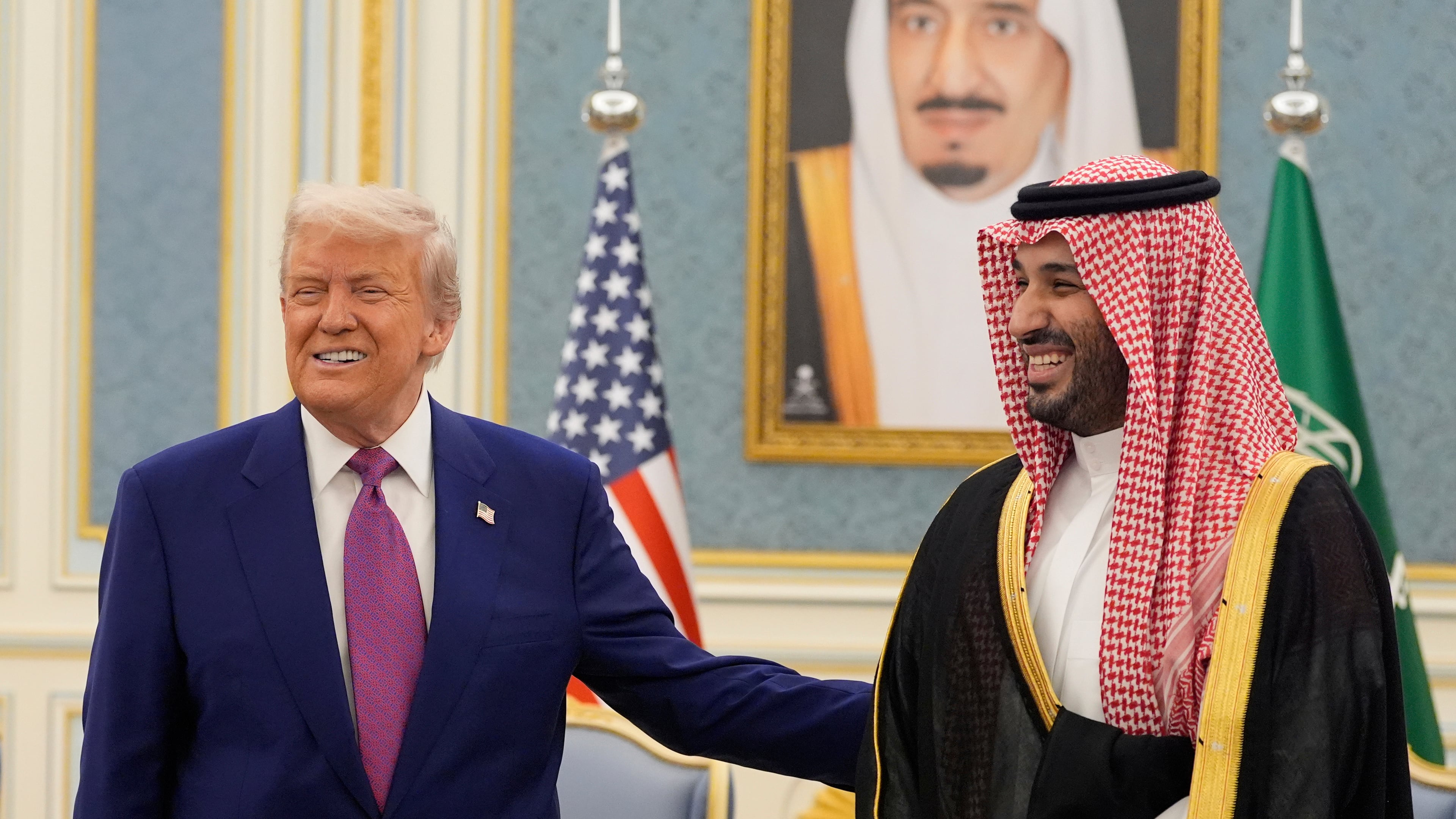 FILE - President Donald Trump and Saudi Crown Prince Mohammed bin Salman gesture as they meet delegations at the Royal Palace in Riyadh, Saudi Arabia, May 13, 2025. (AP Photo/Alex Brandon, File)