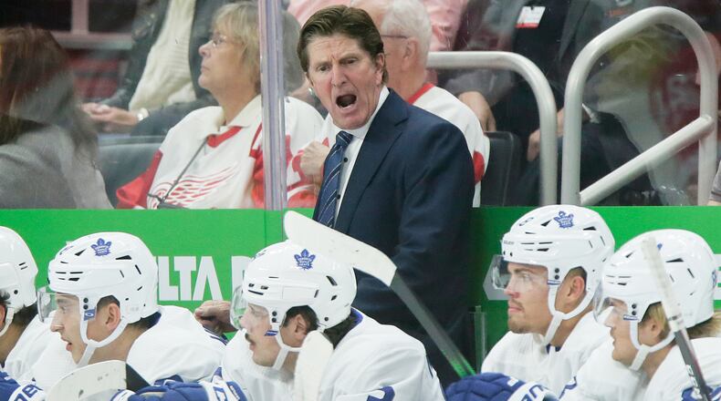 FILE - Toronto Maple Leafs head coach Mike Babcock during the third period of an NHL hockey game against the Detroit Red Wings, Oct. 12, 2019, in Detroit. (AP Photo/Duane Burleson, File)
