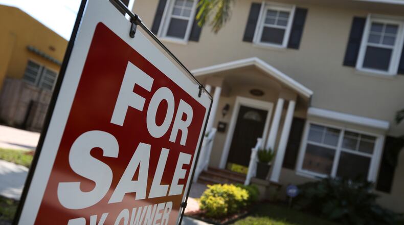 What percentage of homes can professionals afford in Atlanta?