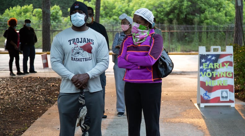 People stand in line to vote at the South Fulton Service Center in May. STEVE SCHAEFER FOR THE ATLANTA JOURNAL-CONSTITUTION