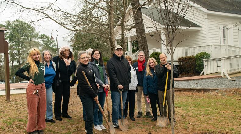 Johns Creek Mayor John Bradberry and council member Erin Elwood recently helped plant a tree at Autrey Mill Nature Preserve, 9770 Autrey Mill Road in celebration of Georgia Arbor Day. COURTESY CITY OF JOHNS CREEK