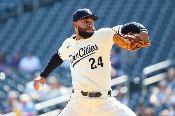 Minnesota Twins starting pitcher Simeon Woods Richardson delivers against the Detroit Tigers during the first inning of a baseball game Sunday, April 13, 2025, in Minneapolis. (AP Photo/Matt Krohn)