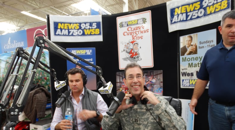 Clark Howard at a Marietta Wal-Mart earlier this month seeking donations for Clark's Kids. CREDIT: Rodney Ho/rho@ajc.com