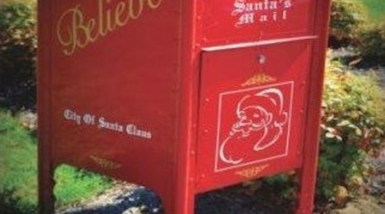Christmas cards receive a red Santa Claus stamp before being mailed.Credit: City of Santa Claus