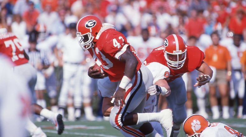 Georgia running back David McCluskey in action against Clemson on Sept. 20, 1986. McCluskey played for the Bulldogs from 1983-86. He also played at West Rome High School. (AJC file photo)