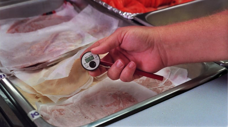 After a power outage, the temperature of food in a fridge is key. (AJC Staff Photo/Curtis Compton)