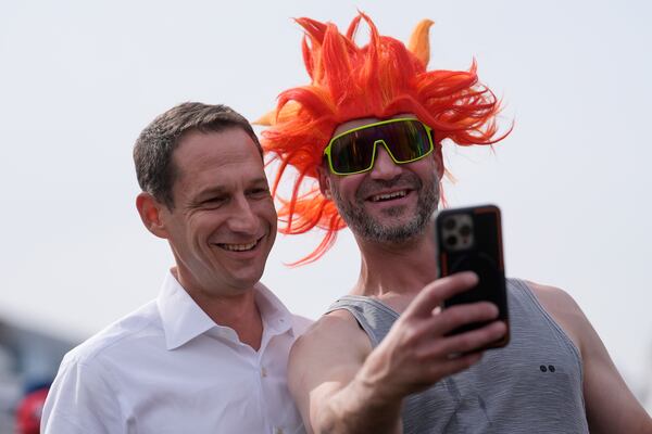 FILE - San Francisco mayoral candidate Daniel Lurie, left, poses for a photo with Martin Damyan, who says he voted for Lurie, in San Francisco, Saturday, Oct. 26, 2024. (AP Photo/Jeff Chiu, File)