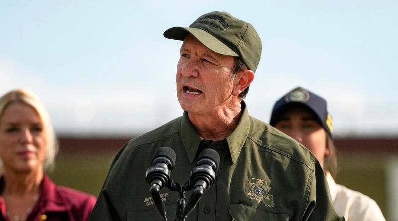 FILE - Louisiana Gov. Jeff Landry speaks to reporters at the Louisiana State Penitentiary in Angola, La., Sept. 3, 2025. (AP Photo/Gerald Herbert, File)