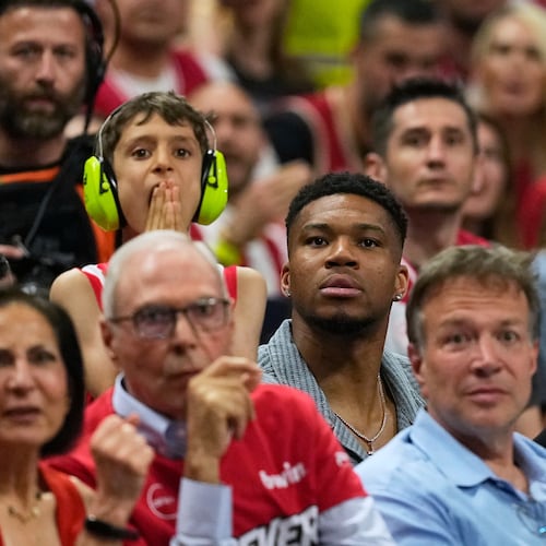 Giannis Antetokounmpo of the Milwaukee Bucks, center, looks on during the Euroleague final basketball match between Olympiacos and Real Madrid in Athens, Greece, Sunday, May 24, 2026. (AP Photo/Thanassis Stavrakis)