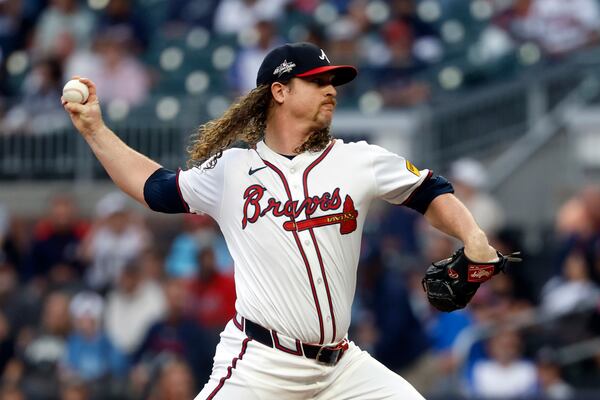 Atlanta Braves' Grant Holmes pitches during the first inning of a baseball game against the Cincinnati Reds, Wednesday, May 7, 2025, in Atlanta. (AP Photo/Butch Dill)