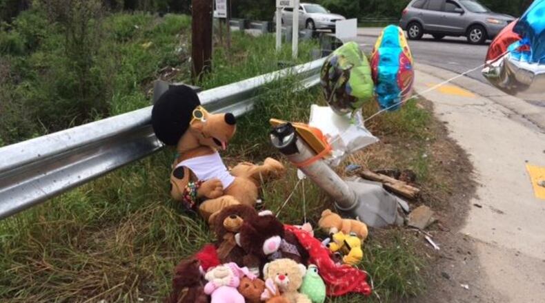 Memorial at the site where two children were killed late Sunday night. (STEVE VISSER/SVISSER@AJC.COM)