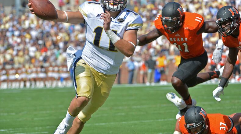 September 10, 2016 Atlanta - Georgia Tech Yellow Jackets quarterback Matthew Jordan (11) holds a football as he scores a touchdown in the first half at Bobby Dodd Stadium on Saturday, September 10, 2016. HYOSUB SHIN / HSHIN@AJC.COM