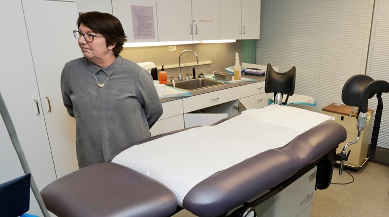 This Feb. 25, 2020 shows Preterm executive director Chrisse France in the procedure room, in Cleveland. Court decisions in two U.S. states Monday, April 6, allowed abortions to continue after the procedure was caught in the crosshairs of governors orders suspending non-essential elective surgeries due to the new coronavirus. (AP Photo/Tony Dejak)