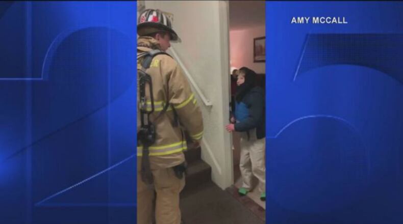 A firefighter used sign language to talk with a special needs boy. (Photo: Boston25News.com)