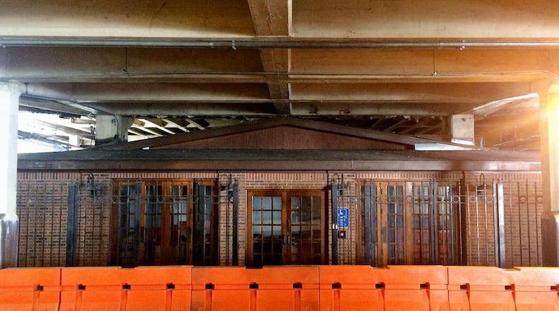 This building beneath the Central Avenue viaduct was built around the Zero Mile Post landmark in downtown Atlanta in the late 1980s. According to the Georgia Building Authority, which owns the building, the demolition is necessary in order to replace two downtown bridges. The post is one of Atlanta’s oldest landmarks and has stood in place since 1850. (PETE CORSON / pcorson@ajc.com)