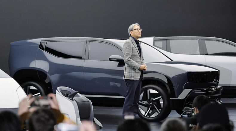 Honda Chief Executive Toshihiro Mibe speaks to the media at Tokyo Mobility Show during a media day at Tokyo Big Sight in Tokyo, on Wednesday, Oct. 29, 2025. (Daiki Katagiri/Kyodo News via AP)