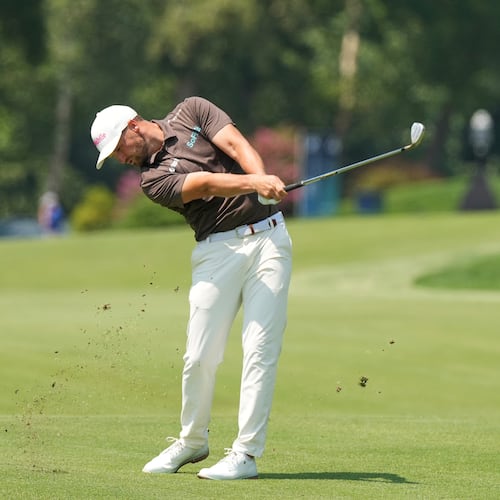 Wyndham Clark hits from the fourth fairway during the third round of the BMW Championship golf tournament Saturday, Aug. 22, 2026, in St. Louis. (AP Photo/Jeff Roberson)