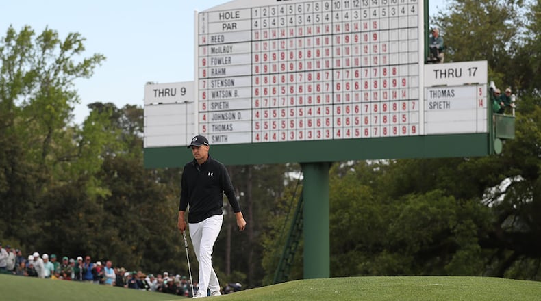 Jordan Spieth approaches the 18th green where he bogey'd to fall to 13-under for the round during the final round of the Masters Tournament Sunday, April 8, 2018, at Augusta National Golf Club.