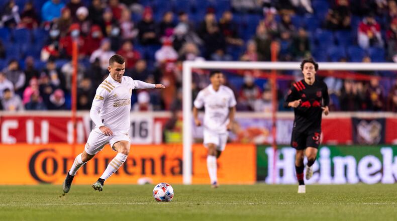 Atlanta United defender Brooks Lennon #11 dribbles the ball during the match against New York Red Bulls at Red Bull Arena in Harrison, New Jersey on Wednesday November 3, 2021. (Photo by Jacob Gonzalez/Atlanta United)
