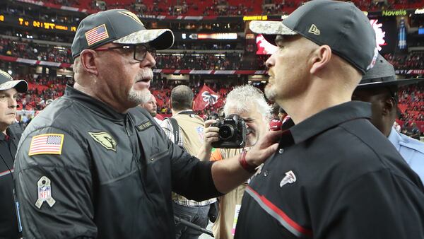 November 27, 2016, Atlanta: Cardinals head coach Bruce Arians congratulates Falcons head coach Dan Quinn on a 38-19 victory over the Cardinals in an NFL football game on Sunday, Nov. 27, 2016, in Atlanta. Curtis Compton/ccompton@ajc.com