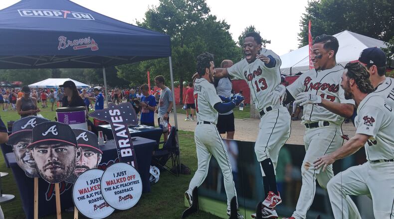 The Braves set up a booth at the finish line of the AJC Peachtree Road Race on Wednesday, July 4, 2018. This time, it included an added twist: All-Star voting. (Gabe Burns / AJC)