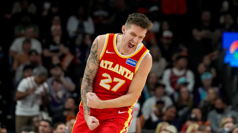 Atlanta Hawks guard Vit Krejci celebrates hitting a 3-pointer against the Phoenix Suns during the second half of Sunday's game Nov. 16, 2025. (Darryl Webb/AP)