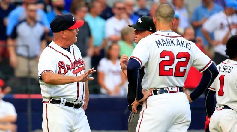 ATLANTA, GA - AUGUST 15: Manager Brian Snitker #43 of the Atlanta Braves argues with the umpires after Ronald Acuna Jr. was hit by a pitch during the first inning against the Miami Marlins at SunTrust Park on August 15, 2018 in Atlanta, Georgia. (Photo by Daniel Shirey/Getty Images)