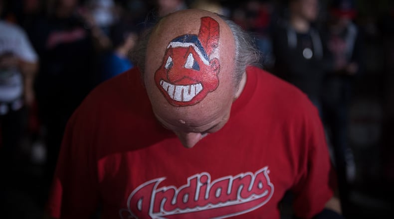 Jim Schulz of Elyria shows off his Cleveland Indians mascot painted head outside of Progressive Field prior to game 6 of the World Series against the Chicago Cubs on November 1, 2016 in Cleveland, Ohio. (Photo by Justin Merriman/Getty Images)