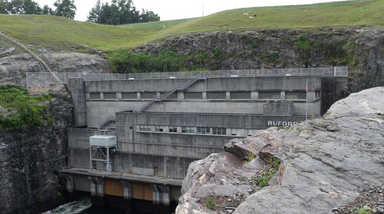 Lake Lanier’s Buford Dam is home to three turbines capable of producing 127 megawatts of electricity – enough to power 57,000 homes. Marty Farrell for the AJC