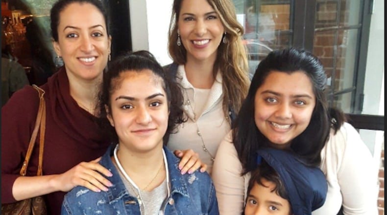 Ghadir Taher (far left) with friends and family in Georgia: Mary Trachian-Bradley (center) Ghadir’s sister Saley Talabani (bottom left) Birva Hansalia and Trachian-Bradley’s son, Gabriel.