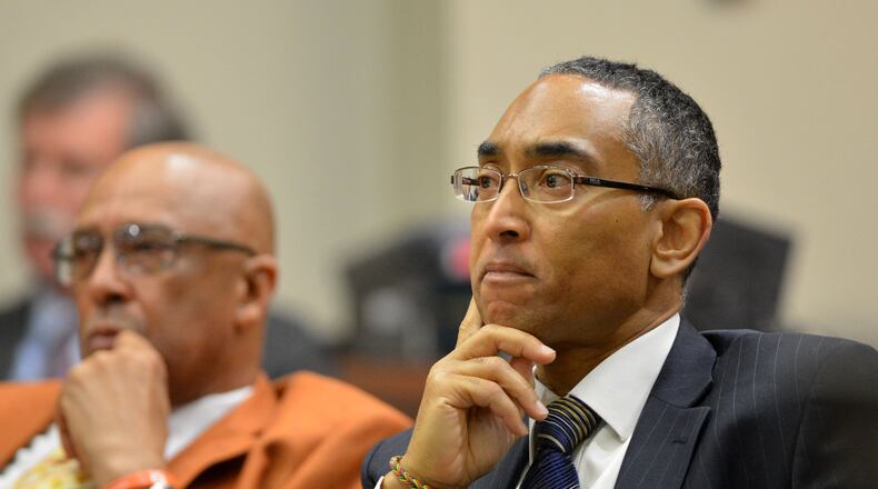 Suspended DeKalb County CEO Burrell Ellis listens to testimony from District Attorney Robert James during a hearing in DeKalb County Superior Court Thursday, January 23, 2014.
