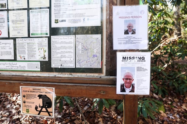 Signs alert hikers at Byron Herbert Reece Memorial Trail of Charles Hosch, who has been missing since Nov. 11. (Abbey Cutrer/AJC)