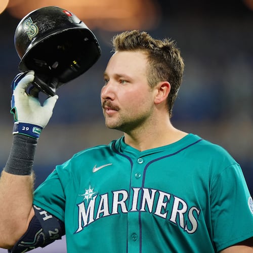 Seattle Mariners' Cal Raleigh reacts after grounding into a double play during the third inning of Game 6 of baseball's American League Championship Series against the Toronto Blue Jays in Toronto, Sunday, Oct. 19, 2025. (Frank Gunn/The Canadian Press via AP)