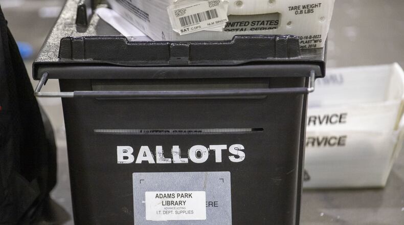 A box of mail-in ballots in Fulton County submitted for the 2020 primary election. (ALYSSA POINTER / ALYSSA.POINTER@AJC.COM)