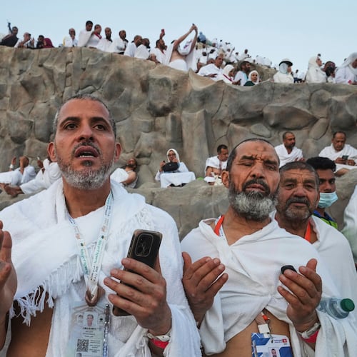FILE - Muslim pilgrims offer prayers on the Mountain of Mercy, on the Plain of Arafat, during the annual Hajj pilgrimage near the holy city of Mecca, Saudi Arabia, June 5, 2025. (AP Photo/Amr Nabil, File)