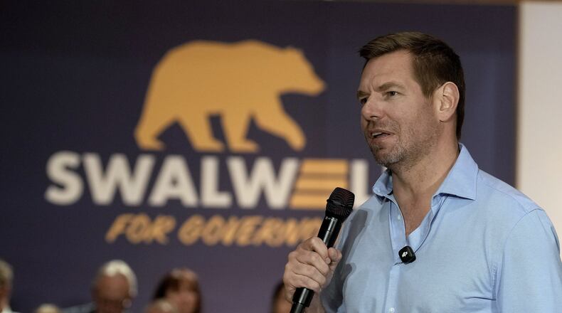 California gubernatorial candidate, Rep. Eric Swalwell, D-CA appears at a town hall meeting in Sacramento, Calif., Tuesday, April 7, 2026. (AP Photo/Rich Pedroncelli)
