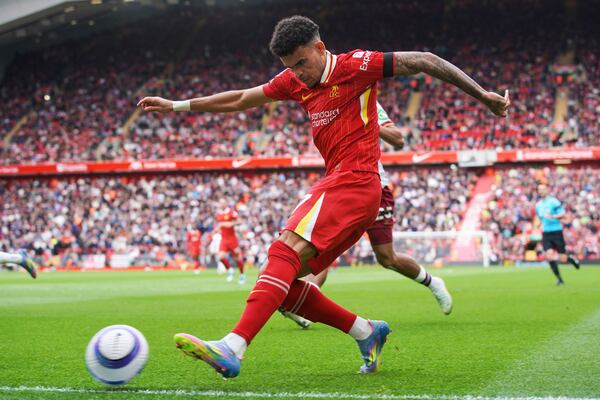Liverpool's Luis Diaz in action during the English Premier League soccer match between Liverpool and West Ham United at Anfield in Liverpool, Sunday, April 13, 2025. (AP Photo/Ian Hodgson)