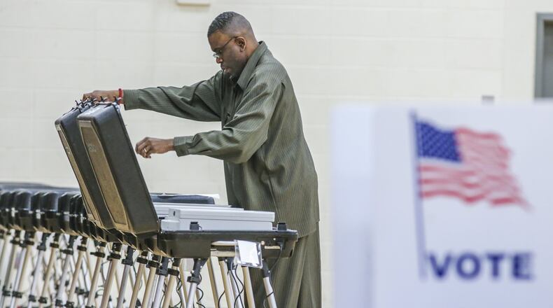 JOHN SPINK /JSPINK@AJC.COM