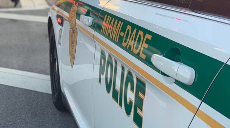 An officer with the Miami-Dade Police Department took steps to help a homeless family return to Michigan.