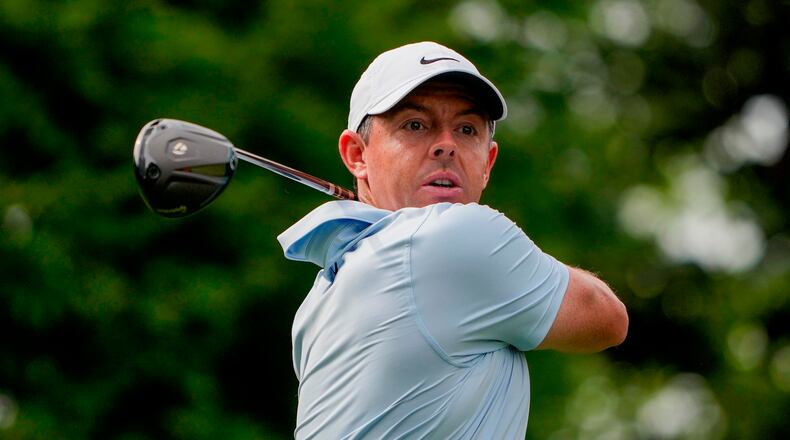 Rory McIlroy, of Northern Ireland, hits from the 16th tee during second round of the Truist Championship golf tournament at the Quail Hollow Club, Friday, May 8, 2026, in Charlotte, N.C. (AP Photo/Chris Carlson)