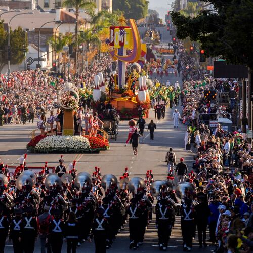 FILE - Marching bands perform along Colorado Blvd. in the 136th Rose Parade, in Pasadena, Calif., Jan. 1, 2025. (AP Photo/Damian Dovarganes, File)