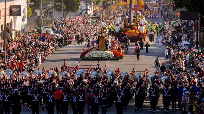 FILE - Marching bands perform along Colorado Blvd. in the 136th Rose Parade, in Pasadena, Calif., Jan. 1, 2025. (AP Photo/Damian Dovarganes, File)