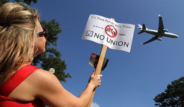 Martha O'Sullivan, at the time a 20-year veteran Delta flight attendant, joined a group of about 50 anti-union flight attendants protesting along Airport Drive at Camp Creek Pkwy on September 29, 2010. The unionization effort failed by 300 votes. 

It was the third time in eight years Delta flight attendants voted on unionization. AJC file