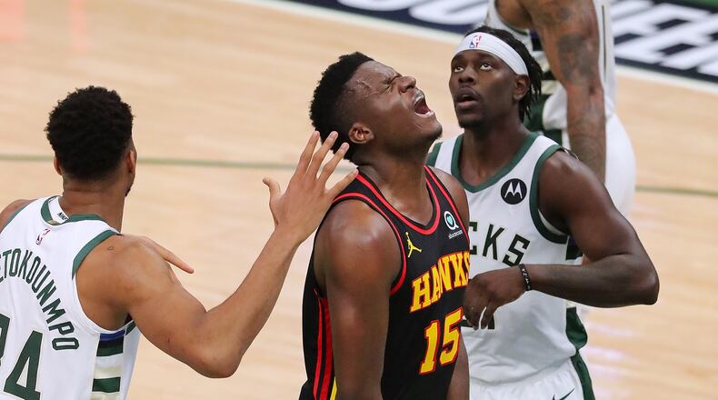 Hawks center Clint Capela reacts to missing his shot after grabbing an offensive rebound.   “Curtis Compton / Curtis.Compton@ajc.com”