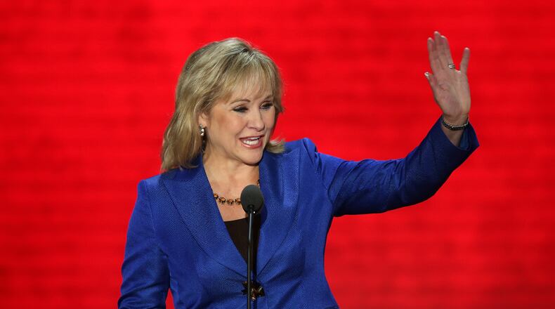 TAMPA, FL - AUGUST 28: Oklahoma Gov. Mary Fallin waves as she walks on stage during the Republican National Convention at the Tampa Bay Times Forum on August 28, 2012 in Tampa, Florida. Today is the first full session of the RNC after the start was delayed due to Tropical Storm Isaac. (Photo by Mark Wilson/Getty Images)