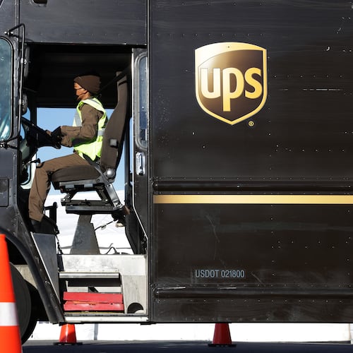Since its founding in 1907, UPS has grown to employ roughly 490,000 people worldwide, including about 4,200 in Atlanta as of 2023. (Alex Wong/TNS 2021)