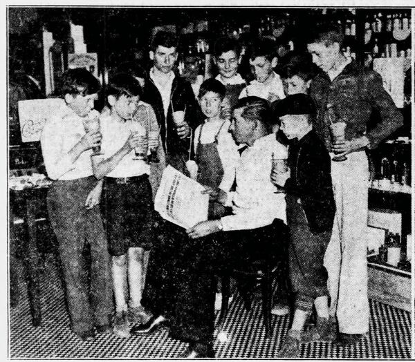 A photo of kids gathered at Wender & Roberts in a 1935 edition of The Atlanta Constitution. (AJC archives)