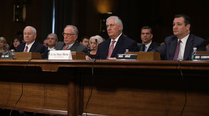 Former U.S. Sen. Sam Nunn (D-GA), second from left, with former Defense Secretary Robert Gates and U.S. Sen. Ted Cruz (R-TX), testifies on behalf of former ExxonMobil CEO Rex Tillerson during his Senate confirmation hearing to be secretary of state on Jan. 11, 2017. (Photo by Alex Wong/Getty Images)